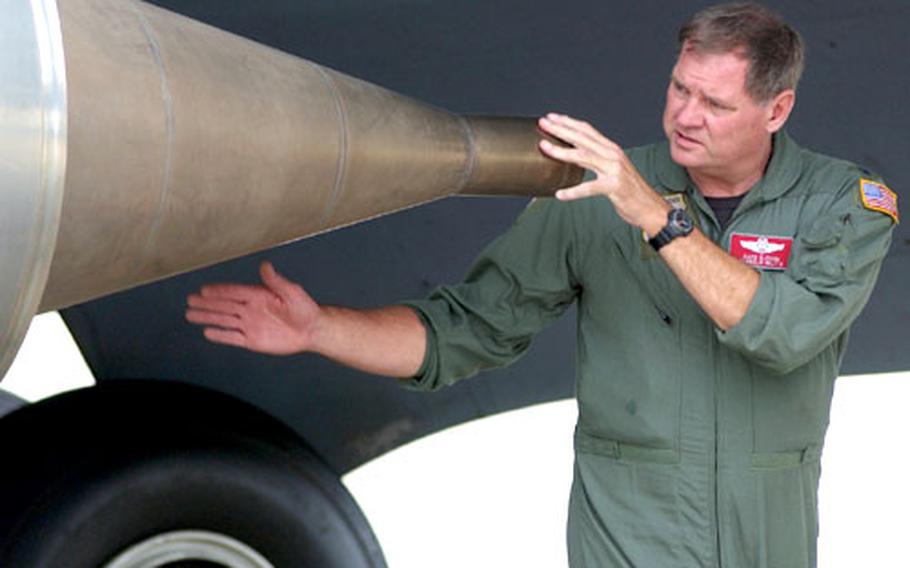 Lt. Col David Glisson, aircraft commander, inspects the engine exhaust on a KC-135 prior to a refueling mission at Rhein-Main Air Base, Germany, on Tuesday. Glisson is from the 186th Air Refueling Wing, Meridian, Mississippi.