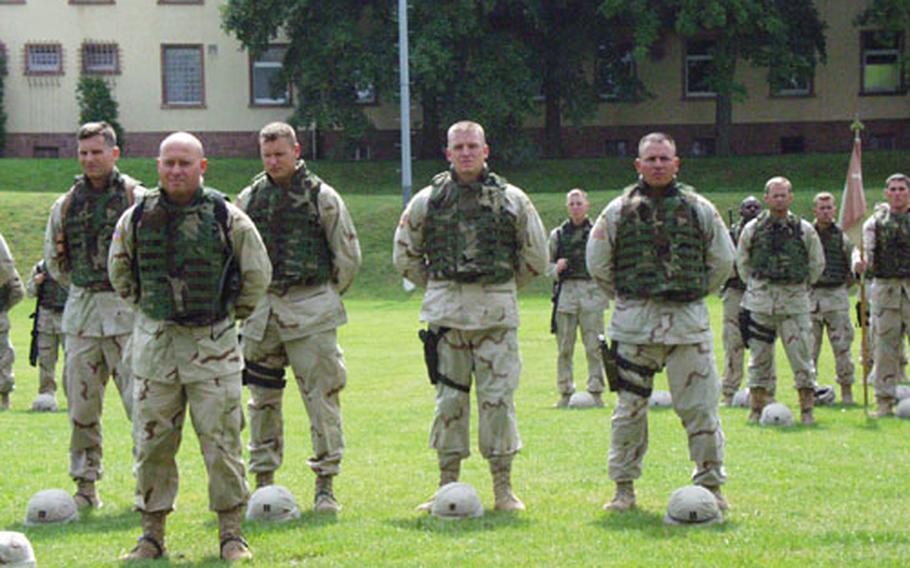 With temperatures rising and troops just days removed from the Middle East, most soldiers taking part in the change of command ceremony Thursday in Büdingen, Germany, were permitted to stand in a relaxed formation without their helmets on for part of the time. Lt. Col. Charles Williams relinquished command of the 1st Squadron, 1st Cavalry Regiment to Lt. Col. John Peeler.
