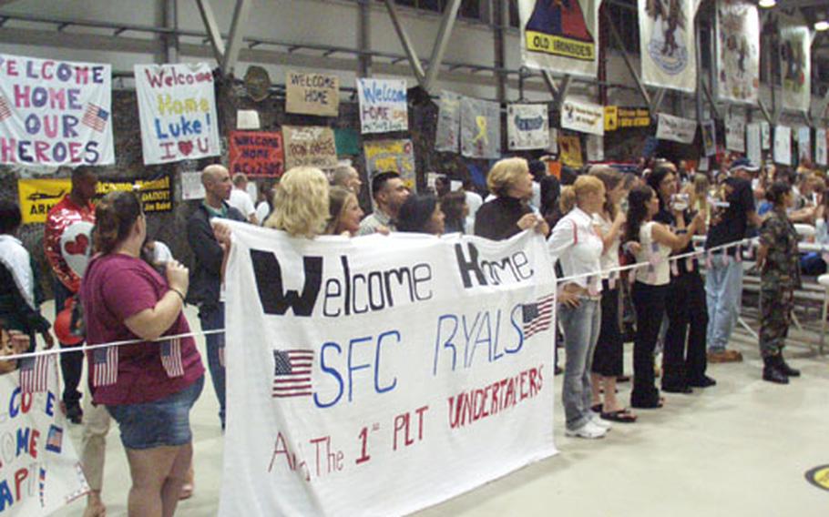 Well-wishers turned out in force early Saturday morning to welcome home nearly 300 troops from the 4th Brigade, 1st Armored Division, based in Hanau, Germany.