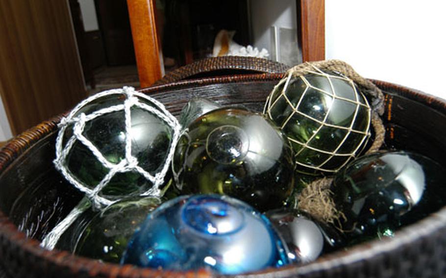 Some of Chief Aviation Maintenance Administrationman John Herreria&#39;s glass fishing floats in his home at the Naval Air Station Sigonella Maranai Housing area. Herreria curently has about 1,500 of the floats.