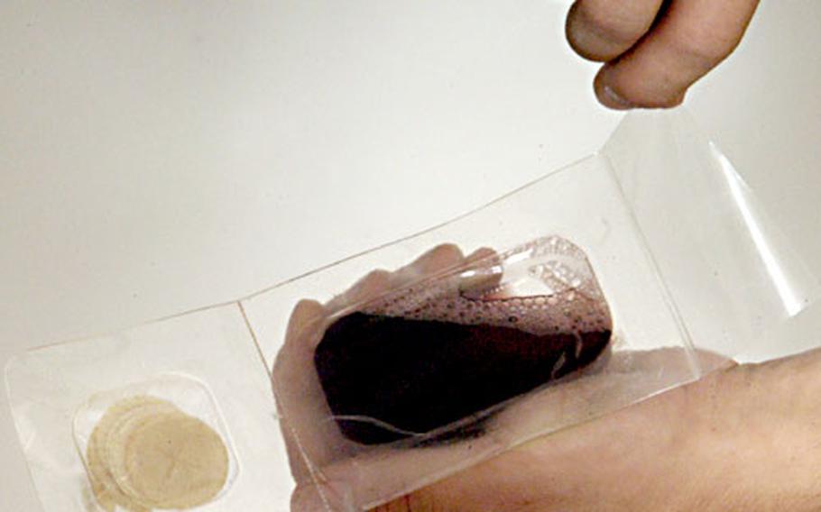 The Small Group Sacramental Packet, shown above with grape juice, will help chaplains offer Communion to churchgoers in the field.