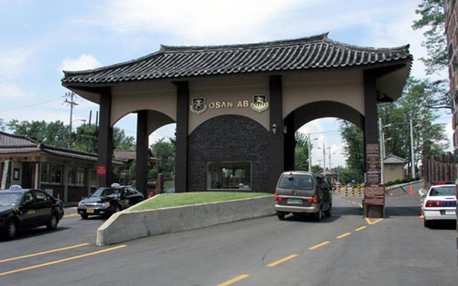 Traffic moves in and out of the main gate at Osan Air Base, South Korea, in this undated file photo.