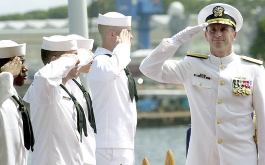 Vice Adm. Jonathan Greenert arrives at Yokosuka Naval Base as the new commander of the Seventh Fleet. The traditional change of command ceremony was held on the USS Coronado on Friday.