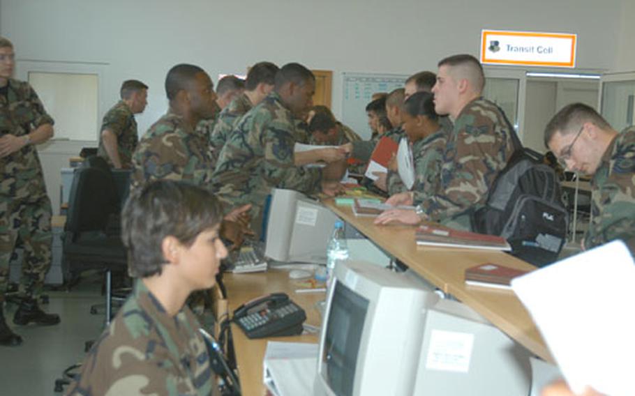 Spangdahlem airmen go through the base's deployment center, talking to finance, medical, and legal specialists, as well as unit chaplains. About 1,000 of the air base's 5,500 airmen are deploying to 21 locations worldwide in the coming weeks.