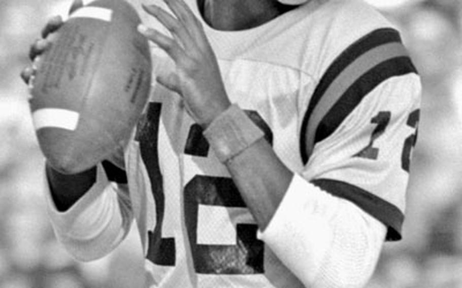 Grambling's Doug Williams looks for an open receiver during the Mirage Bowl. Williams was named the most valuable player in the game after leading his team to a 35-32 win.
