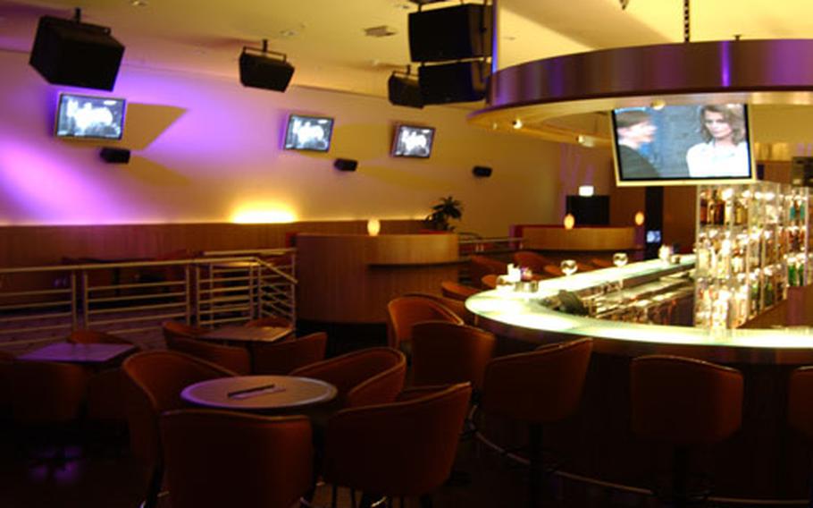 Martini&#39;s, a club with a piano bar atmosphere, is one of several attractions at the Ramstein Air Base Enlisted Club which officially opened Thursday.