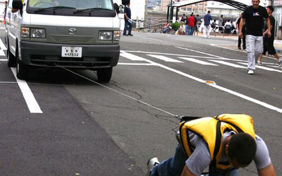 The Strongman Contest featured contestants pulling a security vehicle Sunday, including Fireman Joshua Soderberg from the USS Stennis. He said it was such fun he’s like to do it again.