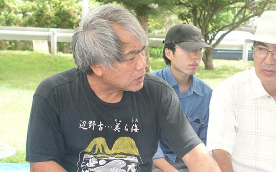 Zenji Shimada, leader of a small sit-in near MCAS Futenma's main gate, said his group will protest there daily until a mass demonstration at Okinawa International Univerity is held Sept. 5.