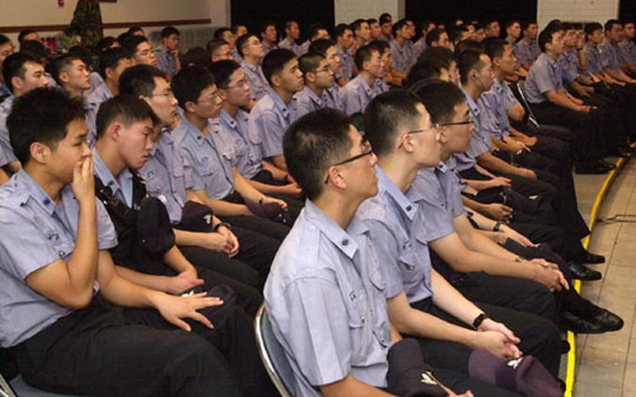 A group of Korean National Police listens to a briefing on Yongsan Garrison Monday. The group, which normally provides security outside the base gates, was given an "appreciation day" on base.
