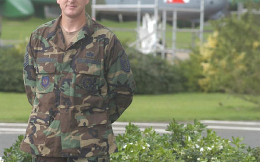 Master Sgt. Jon Stirewalt of the 423rd Civil Engineer Squadron at RAF Alconbury, England, poses at a spot on the base that was named the best-looking small base in the U.S. Air Forces in Europe, part of the command's Combat Proud program.