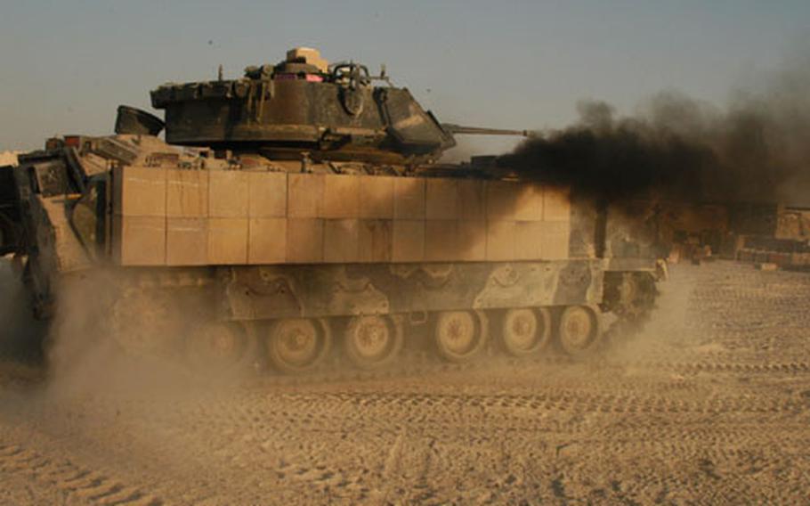 One of the Manchus' Bradley fighting vehicles prepares for action in Iraq across an area of operations that covers 6,000 square kilometers of desert.