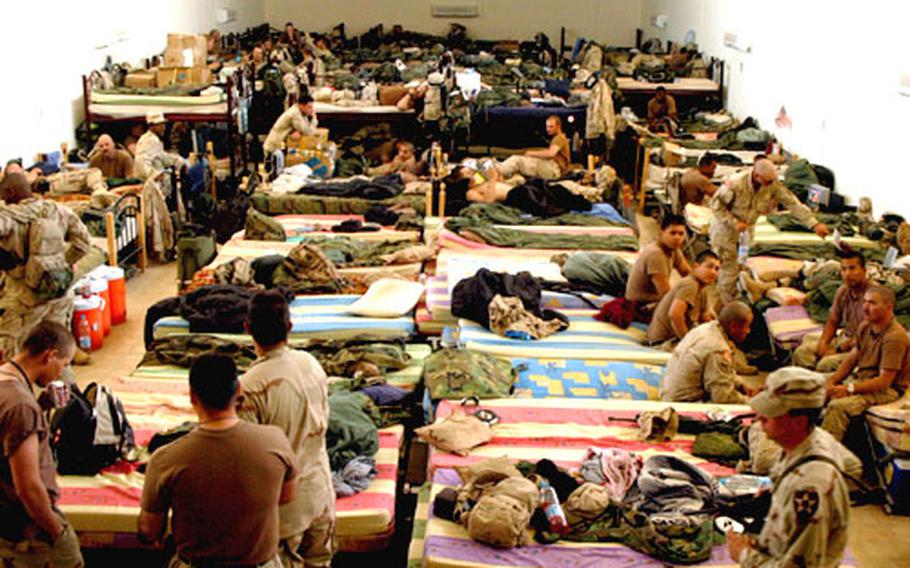 Manchus from 1st Battalion, 9th Infantry Regiment are living in a former morgue while they wait to move in to their barracks in Iraq.
