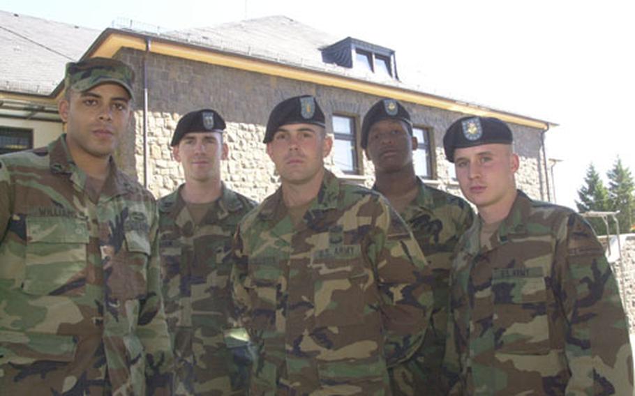 They'll see Berlin on foot, or at least 26.2 miles of it, as eight Baumholder soldiers plan to run the Berlin Marathon. From left are Sgt. Adam Williams, Cpt. Matthew Graham, 2nd Lt. Adam MacAllister, Pfc. Joseph Walker and Pfc. Brent Brzuchalski. Not pictured are Cpl. Steve Rojas, Sgt. Gerry Rojas and 2nd Lt. Dan Downs.