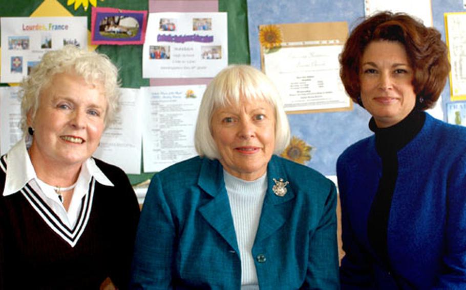 Ilene Stubbs, left, Doris Waldrop, center, and Victoria Robinson spoke to wives of deployed soldiers Tuesday in Bamberg, Germany.