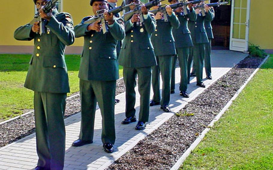 A rifle squad from the 2nd Battalion, 2nd Infantry Regiment fires a salute Tuesday at memorial services for Sgt. Tyler Prewitt, 22, who died Sept. 28 of injuries suffered last week in Iraq.