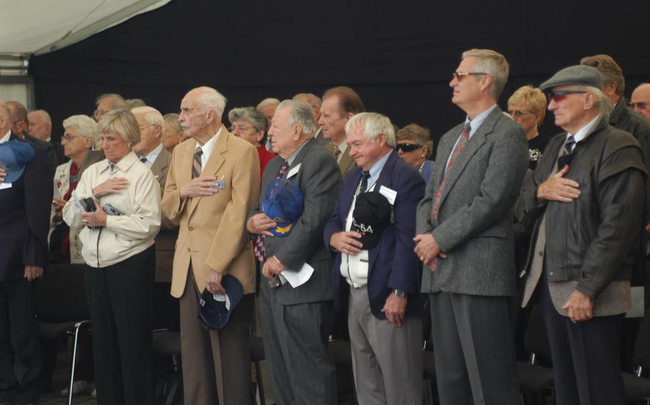 Berlin Airlift veterans pause to remember those who died during the operation at a ceremony Wednesday at the base of the Berlin Airlift Memorial on Rhein-Main Air Base, Germany.
