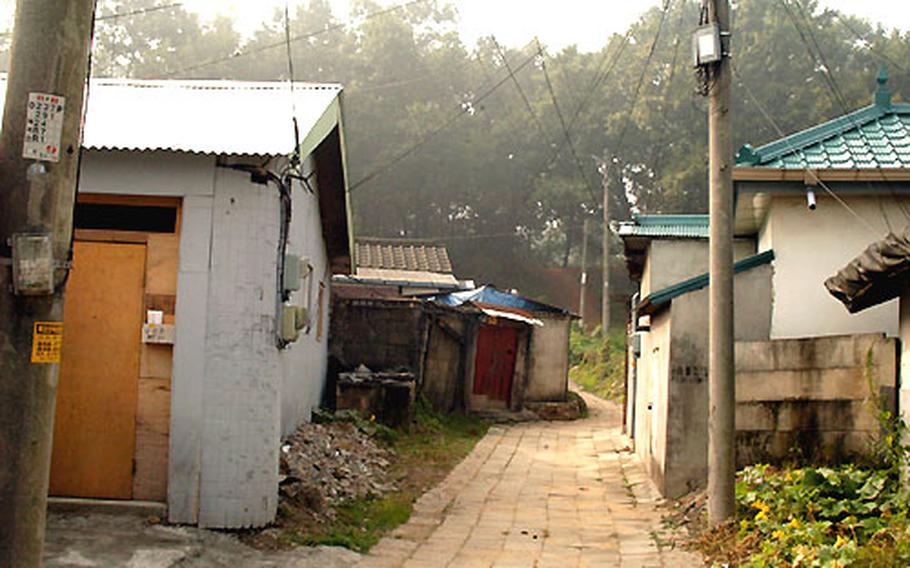 Rosie&#39;s Bar, left, was closed in 1979, when Americans handed over Camp Mosier to the South Korean army, and recently was converted into low-rent apartments.