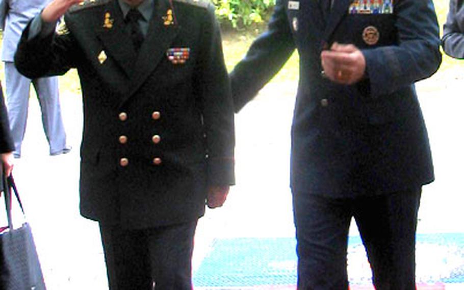 Lt. Gen. Serhiy O. Kyrychenko, left, Ukraine chief of defense, and U.S. Air Force Gen. Charles Wald, deputy commander, U.S. European Command, enter EUCOM headquarters in Stuttgart, Germany, Wednesday.