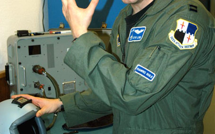 Capt. Kevin Lord, 23rd Fighter Squadron life support officer at Spangdahlem Air Base, Germany, talks about the unit’s new helmet system that allows a pilot to lock on a target with the glance of an eye.