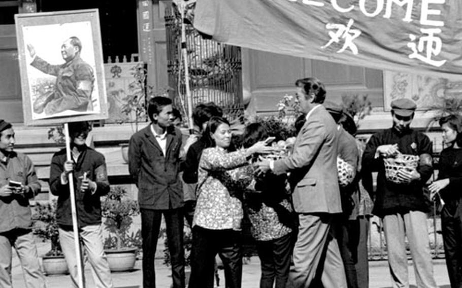 In a scene from ''The Chairman,'' Gregory Peck — as an American scientist who goes to China to discuss a super-fertilizer formula with Mao Tse-Tung — is welcomed by a group of young communists.