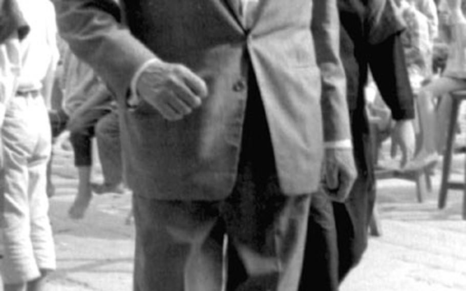 Gregory Peck's stand-in, Eric Wetherell, during the filming of ''The Chairman.''