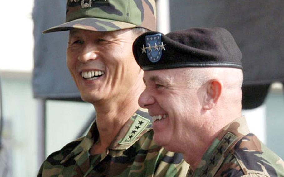 U.S. Gen. Leon J. LaPorte, right, and South Korean Gen. Kim Jang Soo presided over Thursday&#39;s ceremony celebrating the 26th anniversary of the Combined Forces Command. As the top-ranking U.S. millitary commander in Korea, LaPorte heads the U.S. Forces Korea, the CFC and the United Nations Command.