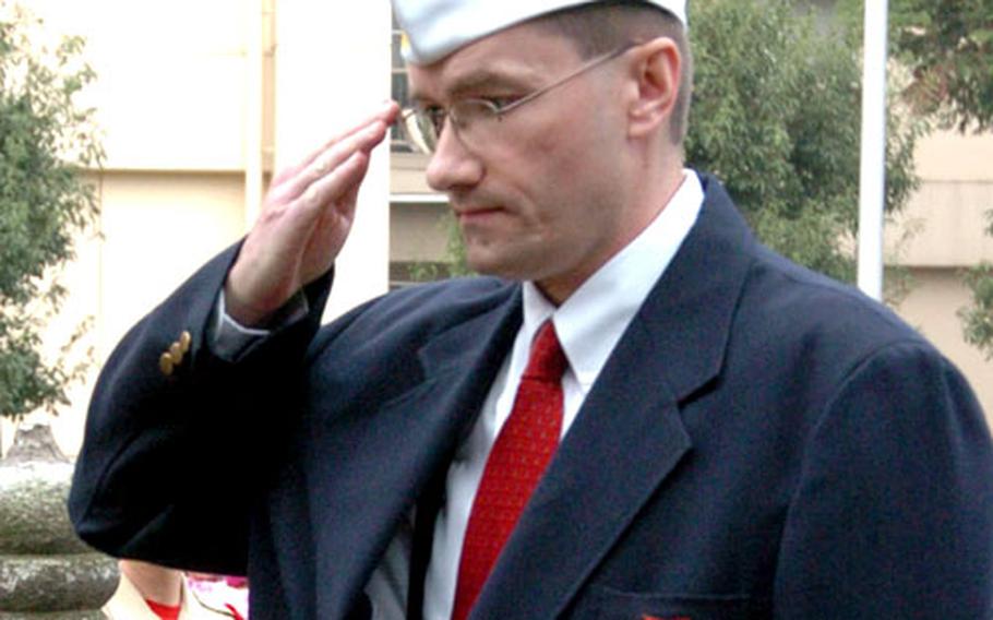 Kurt Music, representing VFW Post 9555, salutes during Thursday&#39;s ceremony.
