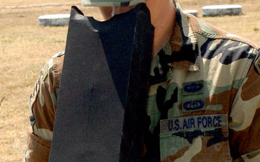 A black box controller, which eliminates interference and sun glare, is used to fly a Raven around a bombing range.