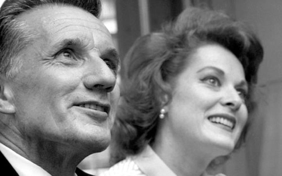 Actress Maureen O'Hara and her husband, airline pilot Charles F. Blair, during a stopover in Frankfurt on his retirement flight in July, 1969.