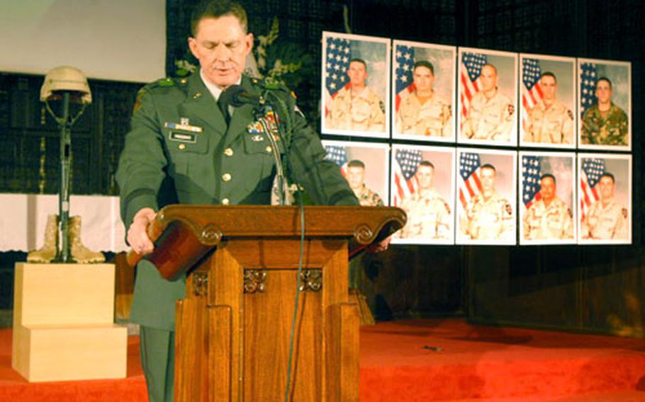 Maj. Gen. George A. Higgins, 2nd ID commander, speaks at Wednesday&#39;s ceremony at Camp Red Cloud honoring Strike Force soldiers killed in Iraq this year.