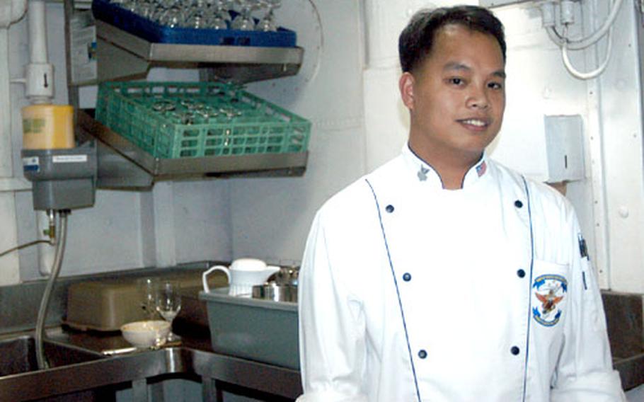 Petty Officer 1st Class Jonathan Villanueva, a culinary specialist aboard the USS Blue Ridge, is the leading petty officer for the Flag Mess — the admiral’s dining area.
