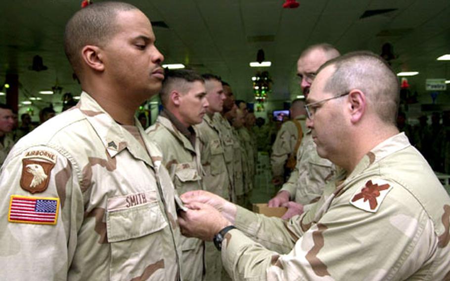 Dozens of soldiers from the 256th Brigade Combat Team, known as Tiger Brigade, were presented with the Combat Infantryman Badge at a Wednesday ceremony at Camp Victory, Iraq.