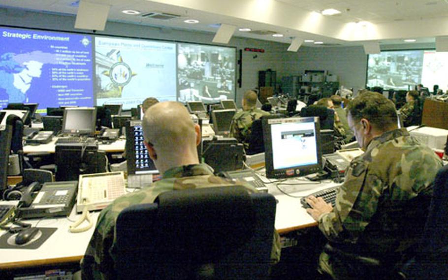 The Joint Operations Center, nerve center of the European Plans and Operations Center — located at Patch Barracks in Stuttgart, Germany — is like a multiscreen indoor ampitheater where servicemembers from all branches and specialties come together to manage crisis situations that occur within the U.S. European Command’s area of responsibility.