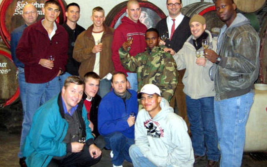 Participants of the Wounded Warrior program offer a toast during their tour of the Rhine River valley. Retired Marine William Black, bottom left, is a civilian analyst for the 66th Military Intelligence Group in Greisheim, Germany.