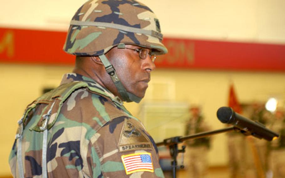 Lt. Col. Tony Chambers, commander, 181st Transportation Battalion, speaks Wednesday at a deployment ceremony on Sullivan Barracks in Mannheim, Germany. The three companies leaving from the battalion will not go until after the New Year.