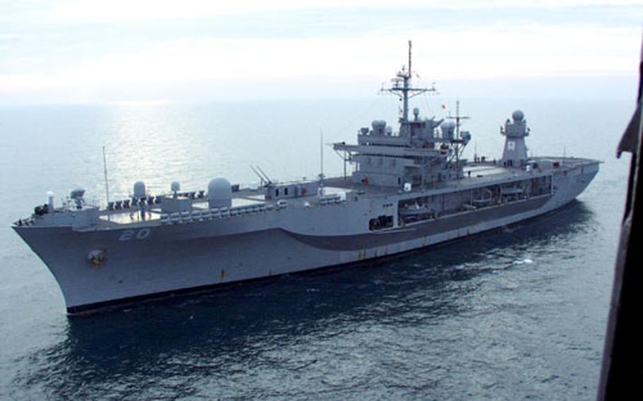 After a 14-day journey across the Atlantic Ocean from Norfolk, Va., the USS Mount Whitney sails toward Gaeta, Italy, early Tuesday morning.