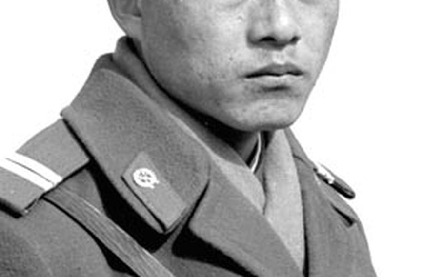 A North Korean soldier on guard duty during the 417th meeting of the Military Armistice Commission glares across the border in February, 1983.