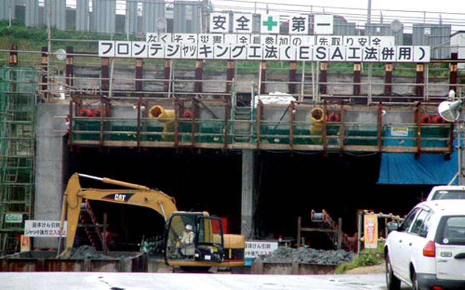Work is about 65 percent complete on a tunnel under Highway 330 that will connect two separate sections of Camp Foster. An officer in charge of construction said the tunnel should be finished next October.