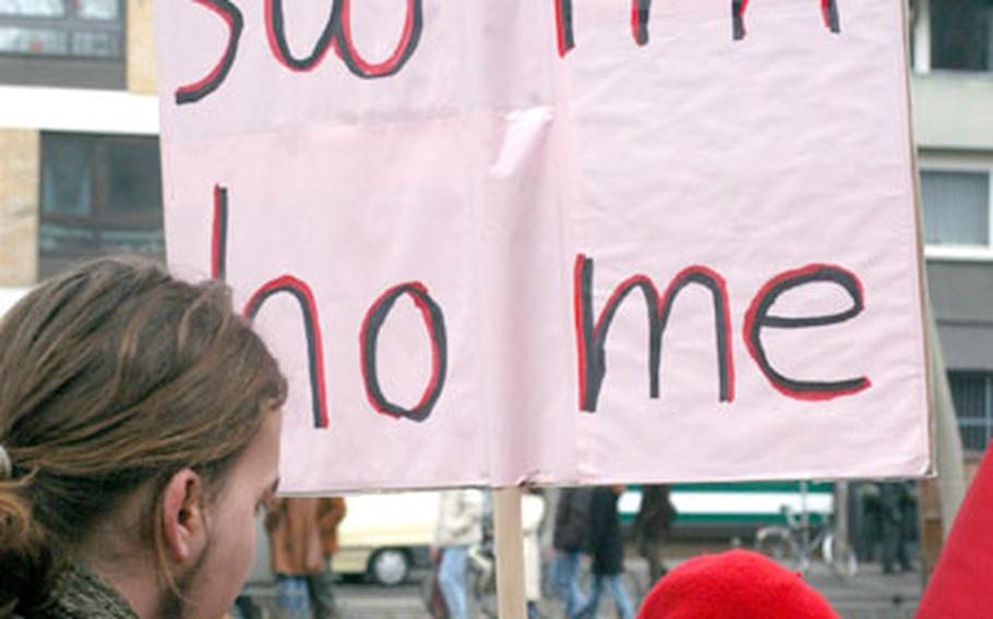 A protester expresses her thoughts about President Bush during a demonstration Wednesday in Mainz, Germany.