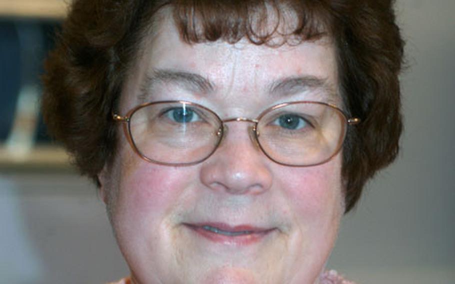 Mary Deats, a music resource specialist at Lakenheath Elementary School, will take two of her dogs to compete in Crufts.