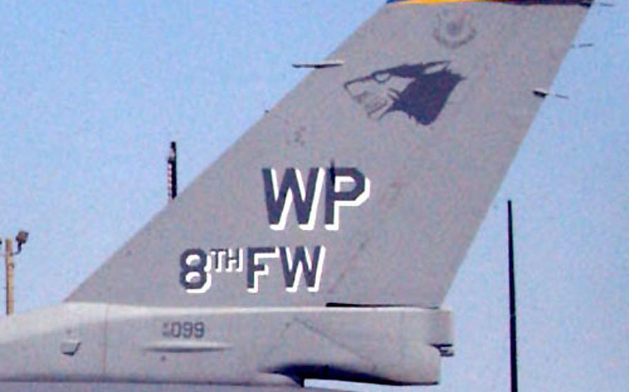 Officials at Kunsan Air Base in South Korea recently provided Stars and Stripes a photo of an F-16 jet flown by the commander of the 8th Fighter Wing, which is known as the Wolf Pack. Stripes, in its April 11 edition, ran the photo with a story about the jet's unique tail-section paint job. Later, Kunsan officials contacted Stripes to say they'd mistakenly provided a photo showing an earlier paint job, not the most recent one. The photo above, taken Thursday (April 14), is the correct one, they said, and shows the latest paint job.