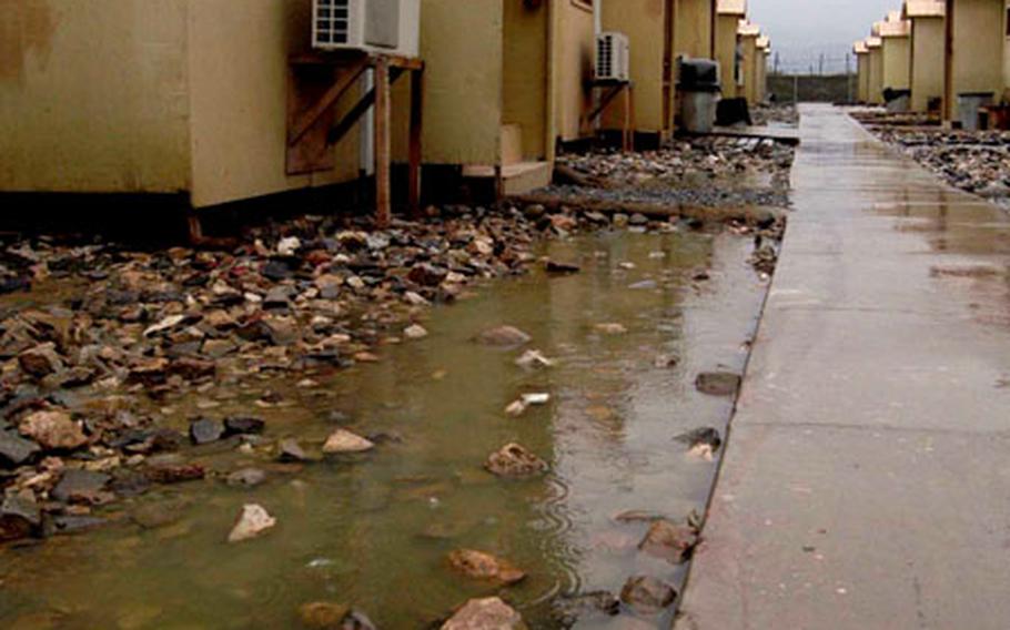 Rain in the last couple of days has left Bagram Air Base in Afghanistan wet and muddy. But unlike other areas of the country, there is no danger of flooding at U.S. military posts.