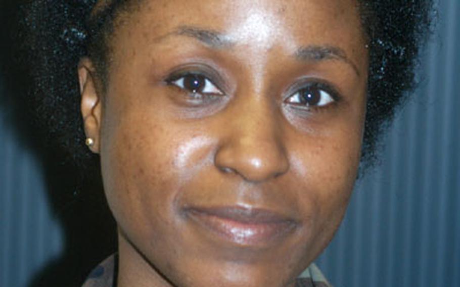 Tech Sgt. Yoketha Mills of 422nd Air Base Squadron, RAF Croughton.