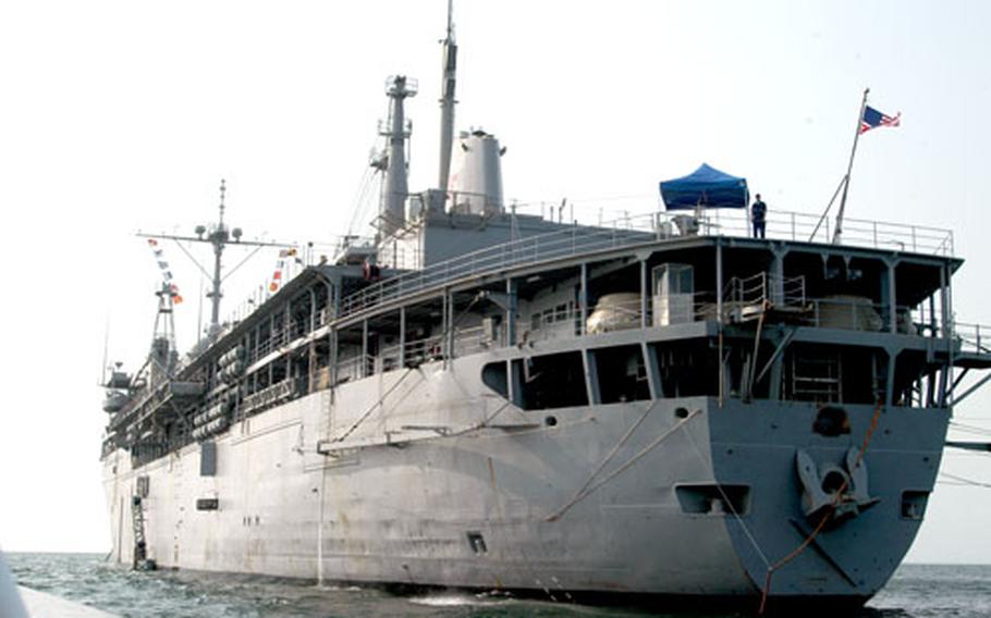 The submarine tender Emory S. Land sits anchored off the coast of Libreville, Gabon on Feb. 20, 2005.