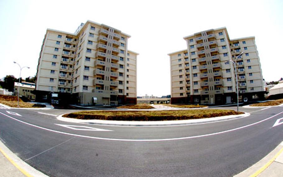 These two new towers opened Friday at Yokosuka Naval Base, Japan. The towers add another 136 units for family housing at the base.