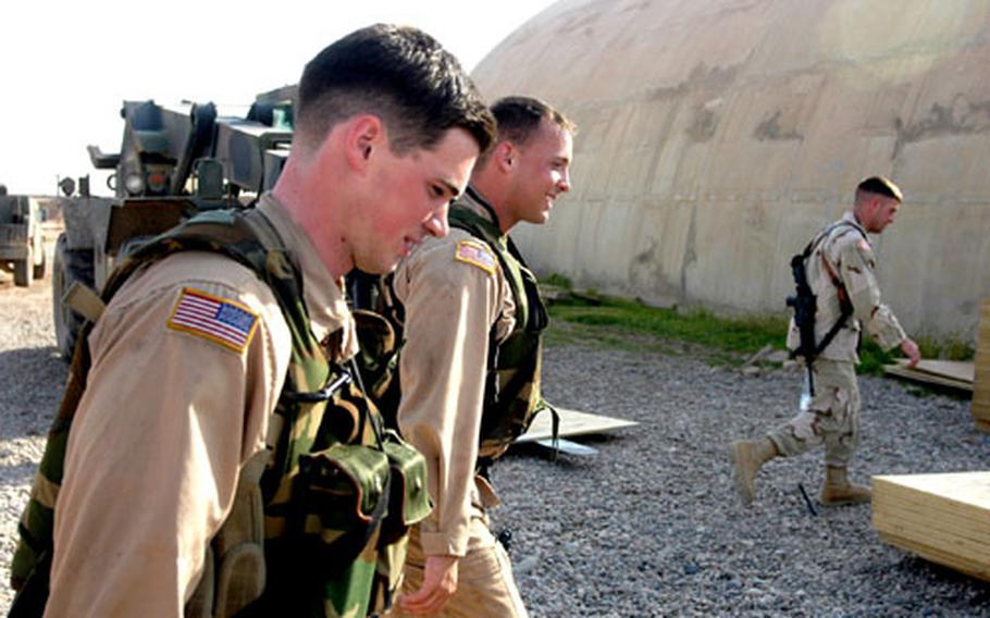 Chief Warrant Officer 2 Charles Folk, left, who will turns 21 on Wednesday, and 24-year-old 1st Lt. Mike Hultquist, both of 1st Squadron, 17th Cavalry Regiment, had about 30 hours of flying time between them before arriving in Iraq late last year. Since then, each has nearly 300 hours in the sky while flying missions for the squadron.