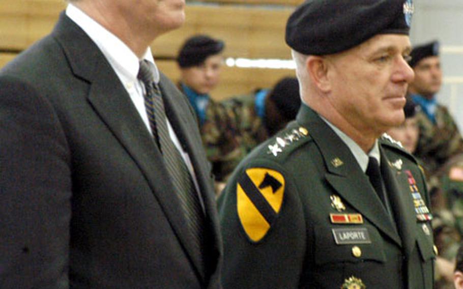 Ambassador Christopher Hill, left, and U.S. Forces Korea commander Gen. Leon J. LaPorte stand together during a ceremony Wednesday to bid farewell to the ambassador.