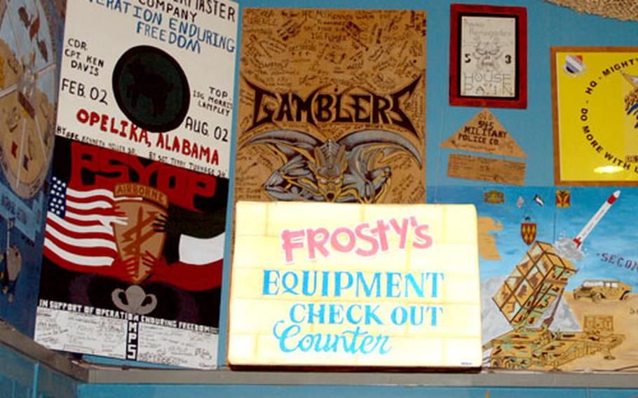 The closing of Camp Doha, Kuwait, also marks the end of the popular Frosty’s hangout, where countless troops gathered to relax, eat and socialize during the camp’s 14-year existence. Over the years, troops left their mark with posters and signs that officials plan to relocate to the new Frosty’s II facility at Camp Arifjan.