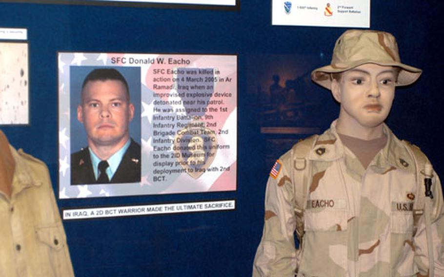 Sgt. 1st Class Donald Eacho’s uniform is part of a display at the 2nd Infantry Division Museum commemorating the 2nd ID’s deployment to Iraq. Eacho was killed in Ramadi in March.