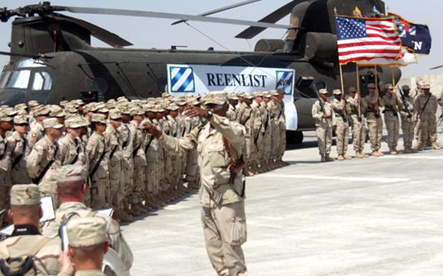In the largest re-enlistment ceremony ever held in Iraq, 177 soldiers from the 3rd Infantry Division's Aviation Brigade at Camp Taji pledged a fresh commitment to the Army.